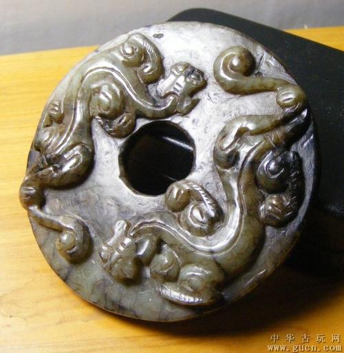 包老包退包快递.唐代和田青玉带黑沁高浮雕双螭龙纹饰大玉璧