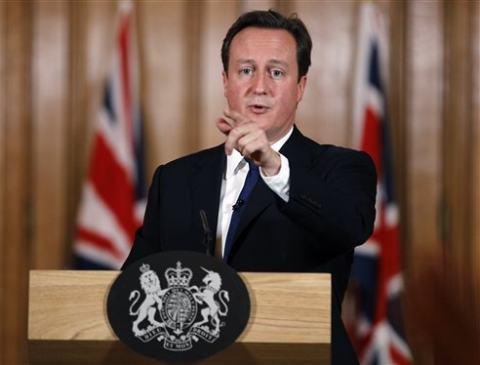 britain"s prime minister david cameron gestures during a press