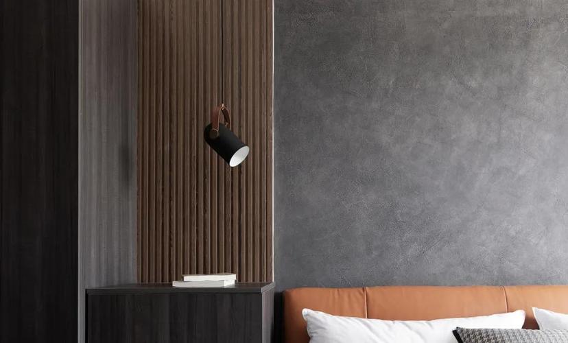 沉稳的深灰色背景墙由mm艺术涂料肌理漆打造,兼具厚重肌理与高级质感