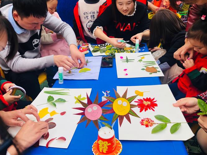 金种子幼儿园"多彩的秋天"树叶粘贴画亲子趣味活动