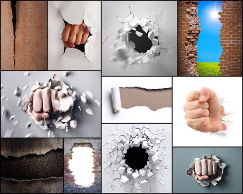 拳头与墙壁摄影高清图片