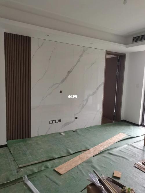 电视背景墙,木格栅配岩板,当初后悔没有整块做岩板,现在看看也还好