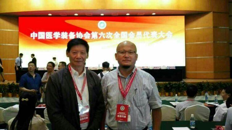 童劲松与中国医学科学院北京肿瘤医院胡逸民教授
