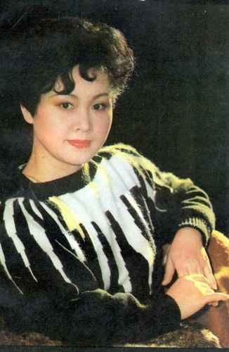  p>这是歌唱家 a href="#" data-lemmaid="889974">李谷一 /a>在1981