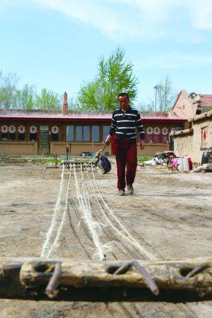 千摇万摇拧长绳(组图)