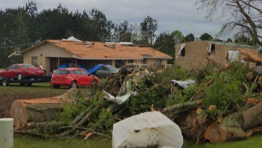 alabama man helps clean up possible tornado damage in