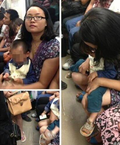 地铁内给孩子把尿