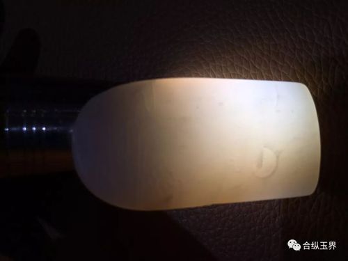 文化 正文  和田玉是一种云絮状纤维交织的结构,透闪石纤维非常细小