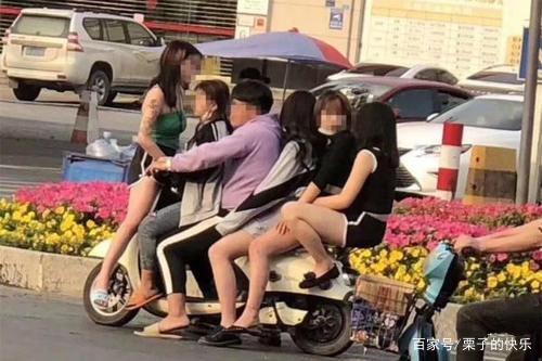 男子骑电动车载5名女乘客