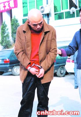 武汉破获摇头丸大案 毒贩"光头华子"被刑拘(图)