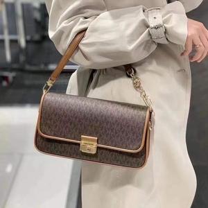 美国代购mk bradshaw腋下包新款女包法棍包单肩手提翻盖 双肩带包