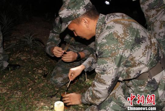 屯昌县大同镇试场村一处工地挖出一枚未爆炮弹,海南省军区某排爆部队