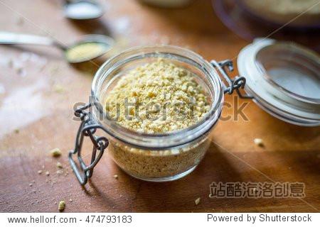 cashew nuts with garlic and salt in bowl - vegan parmesan cheese