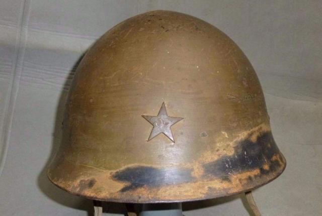 由于东北军不抵抗,日军还不知道钢盔的效果如何