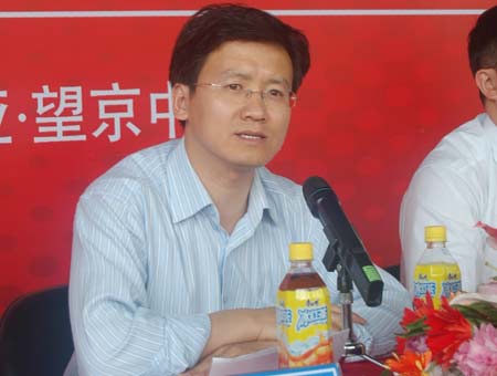 图为北师大房地产研究中心副主任王宏新教授