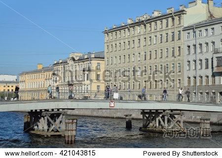 call wooden pedestrian bridge across the river fontanka in saint