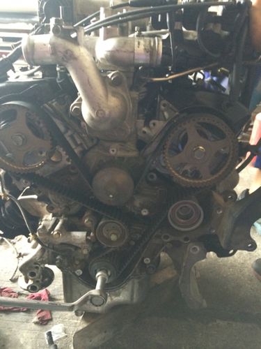 三菱帕杰罗v6外围皮带套法