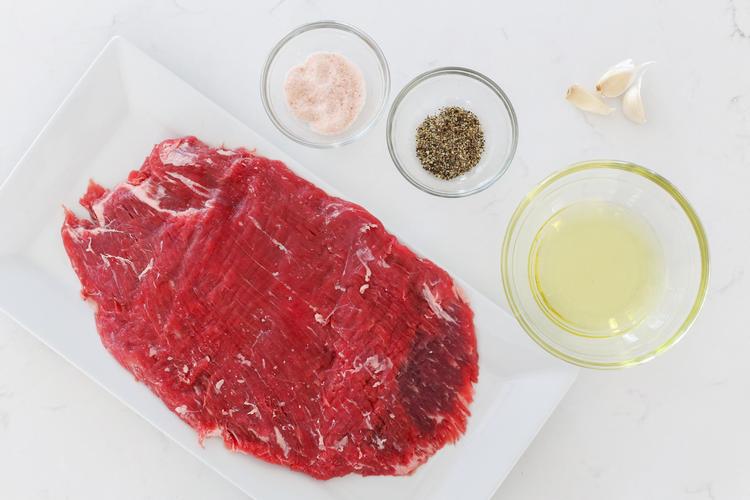 flank with marinate ingredients next to it
