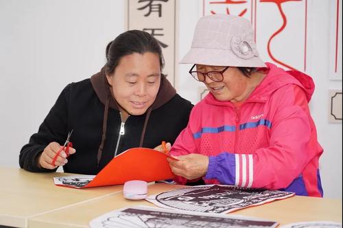 红色剪纸寄初心深学党史开新局上马街道开展建党主题剪纸交流活动