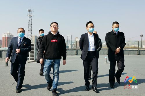 巩志岗在区融媒体中心调研