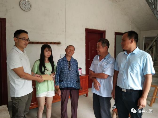 江西威信工业有限公司董事马君恒先生亲自到信丰县铁石口镇上塘村,为