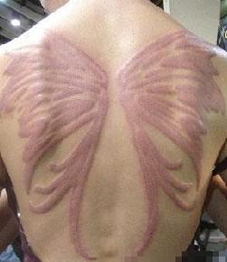 鸽子血纹身|纹身喝酒就会出现的说法