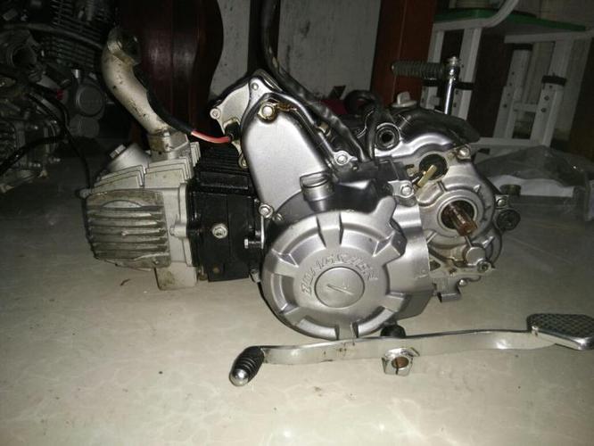 家里的力帆摩托车110的发动机想换个125的,要多少钱?