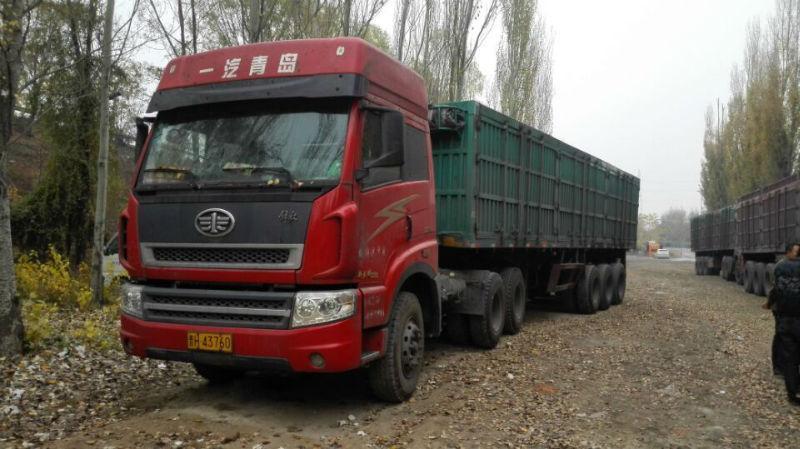 【上饶】2012年7月 欧曼,解放,德龙等二拖三半挂车 红色 手动挡