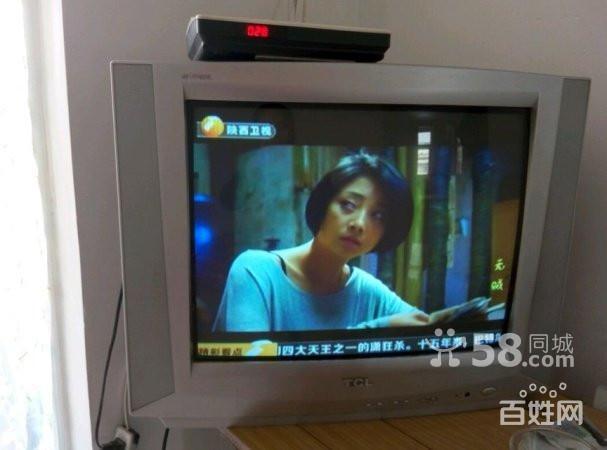 21寸tcl彩色电视一台,带机顶盒,信号增强器,欲