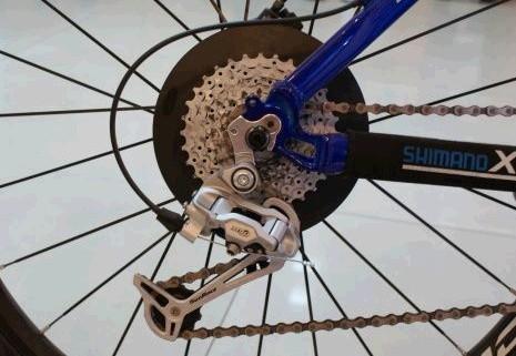 1,导向轮,是后拨链器上部靠近飞轮的塑料齿轮,作用是变速过程中为