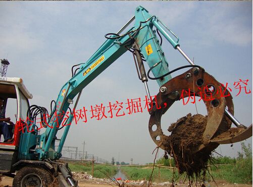 挖拔树根挖掘机