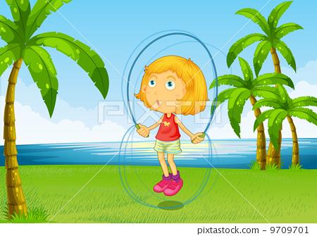 a girl playing skipping rope at the riverside