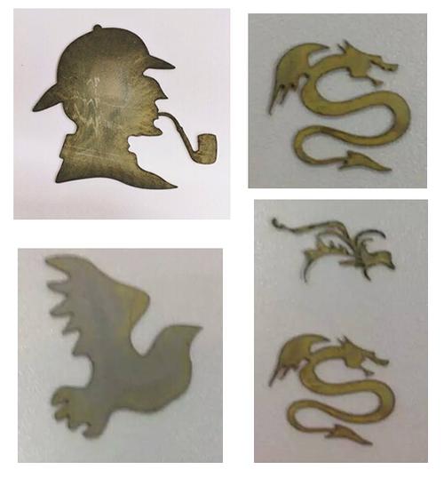 图片说明:学生通过数控电火花线切割完成的一组金属作品