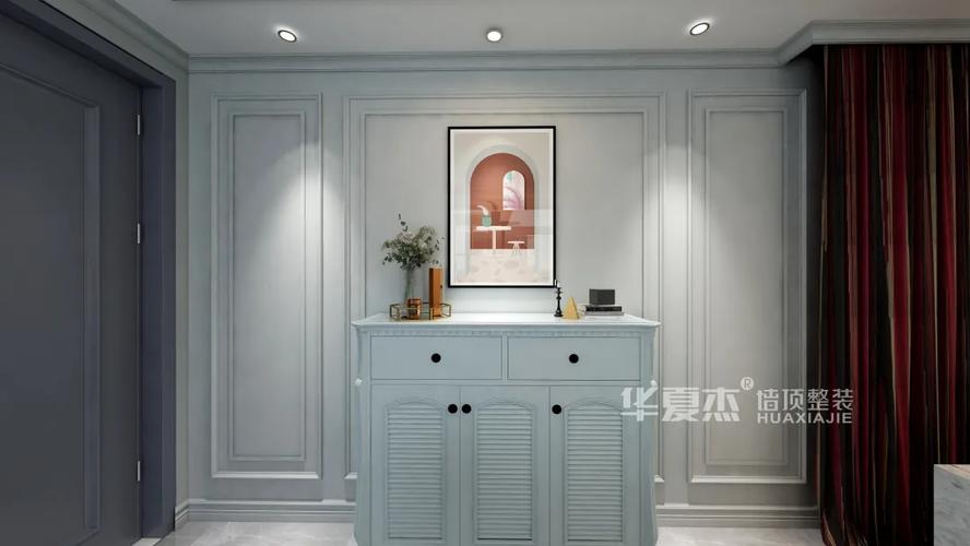 成品玄关柜 墙板玄关 简单的墙板加上成品玄关柜和装饰画,也是个不错