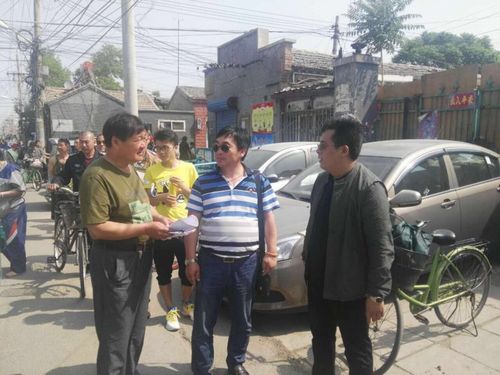 中仓街道办事处副主任王秀民现场协调"煤改电"