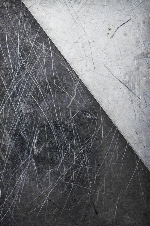 粗糙的铝纹理背景与划痕