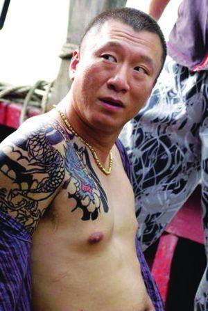 孙红雷演咯地请开手机里的纹身图片是什么?谁有全图,发给我张```谢谢