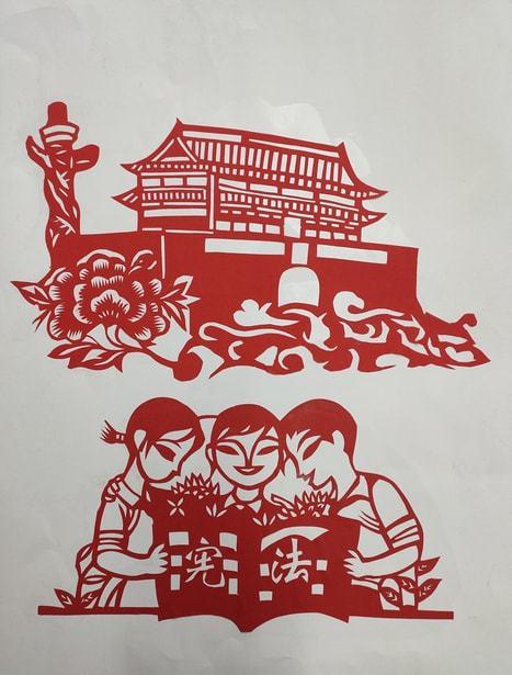 (临洮县洮阳镇学区 陆红玉)《依法治国》剪纸作品.