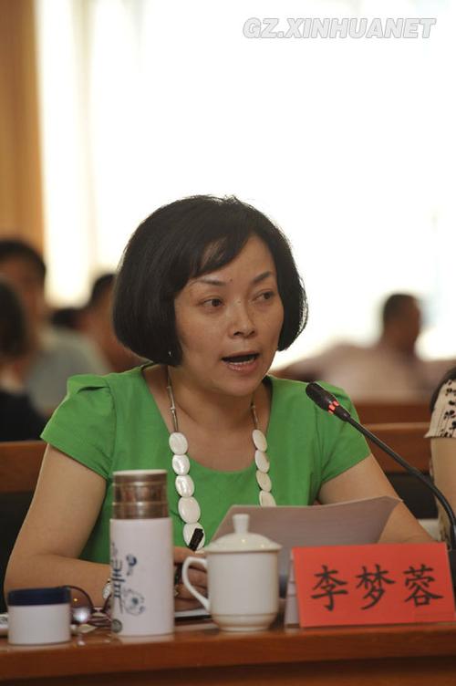 贵州省计生委宣教处处长李梦蓉在会上发言.新华社记者 欧东衢 摄