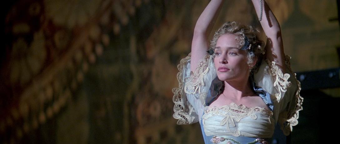 two stage magicians engage in competitive one-upmanship in an