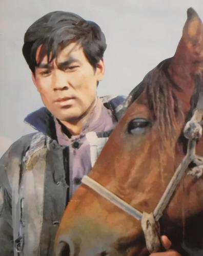 (朱时茂《牧马人》剧照)