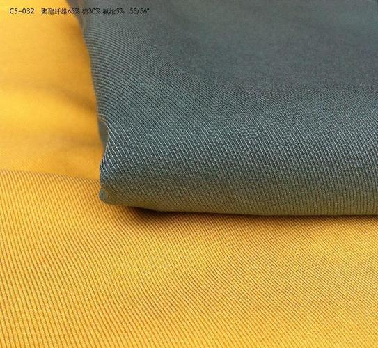 厂家直销时尚涤棉不易褪色仿牛仔染色四季休闲裤服装布料