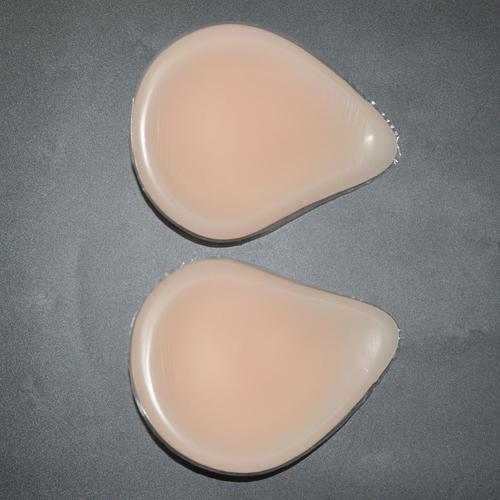  p>医用假乳 ,又称插入式硅胶胸垫,义乳,假乳房.