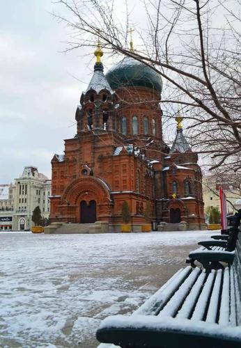 冰城,哈尔滨 因雪浪漫,因雪唯美 飘雪的夜 是在中央大街的灯影微黄下
