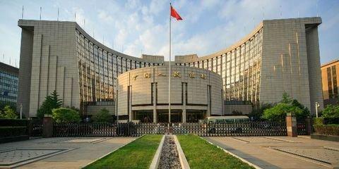 这篇快评的大概意思是:出于稳定股市的考虑,中央银行持有本国股票,并