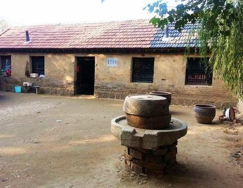 房屋的正大门口适合摆放磨盘,磨盘一般放在哪里?|石磨