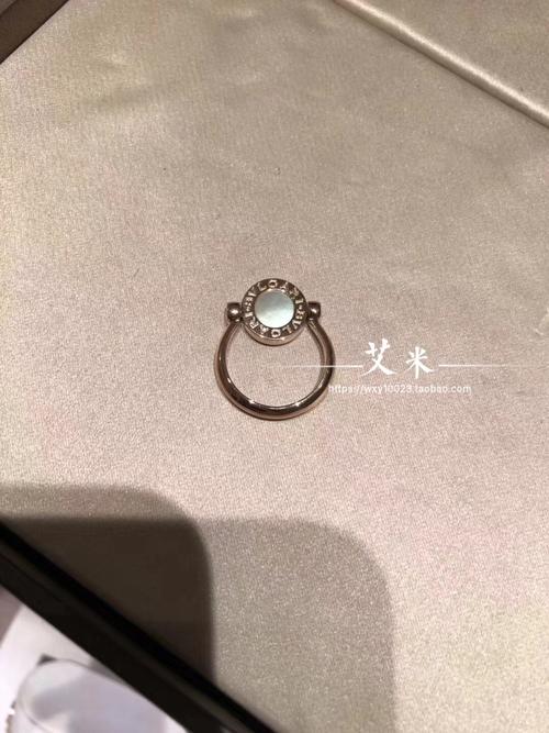 查看淘宝宝格丽bvlgari 18k玫瑰金白贝母 红玉髓 孔雀石 双面旋转戒指