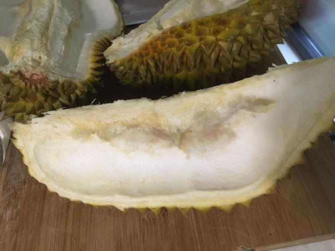 榴莲破开来果肉的核部有些发黑,如照片,是不是坏了?可