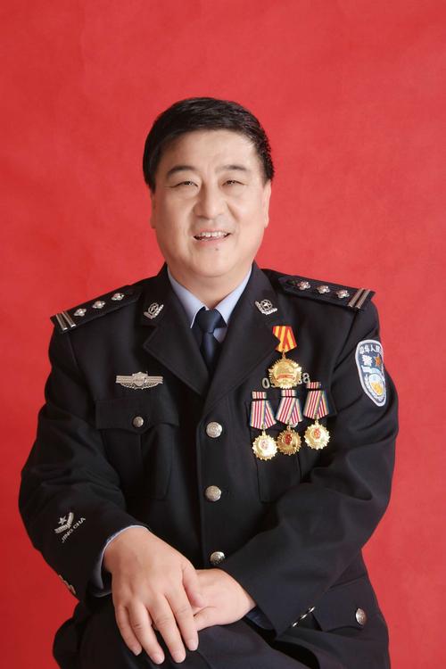 相册制作人,新四军后人,盐城市公安局一级警督警官李士彬!