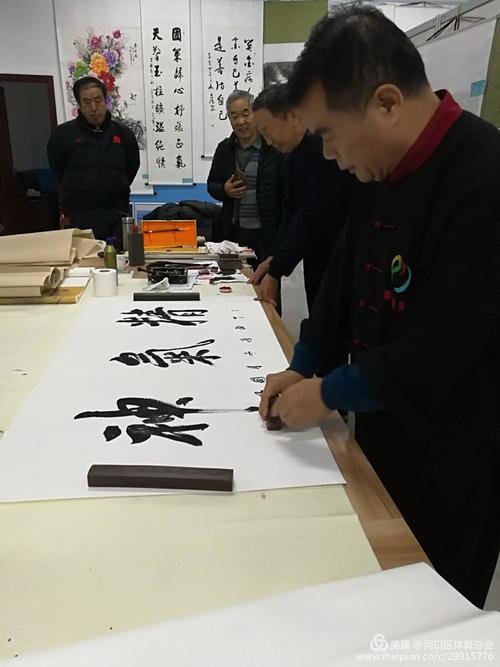 共100余名太极爱好者进行了考评,随后武术,书法家刘国明先生对本次
